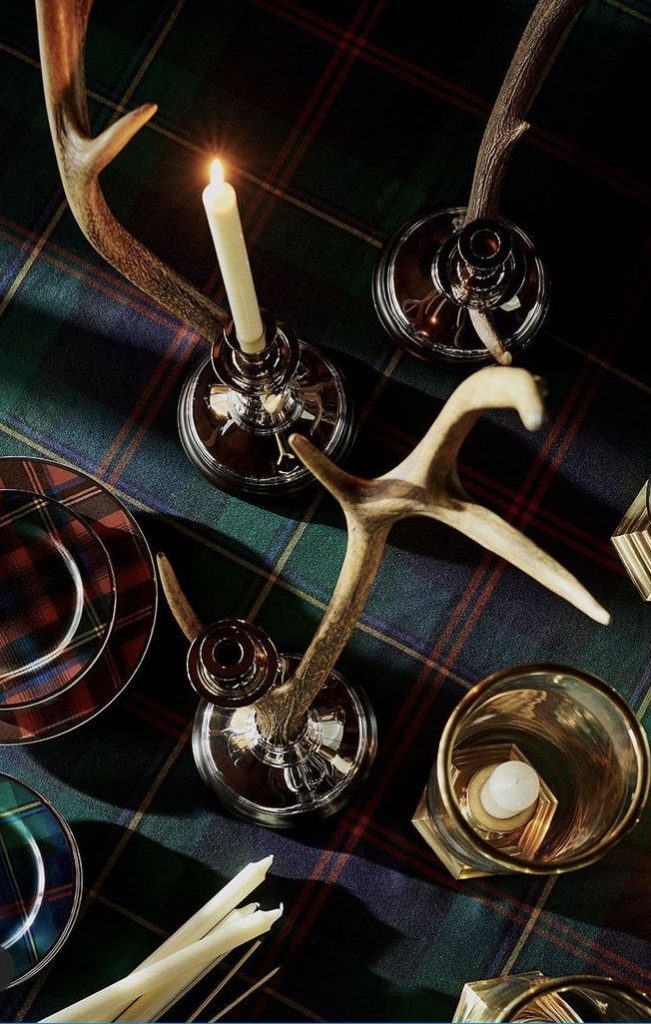 Antler candle holders and tartan accents for a Ralph Lauren inspired Christmas dinner