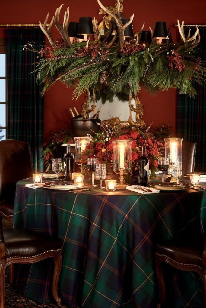 Tartan dining room with candlelight and floral centrepiece, Ralph Lauren Christmas décor