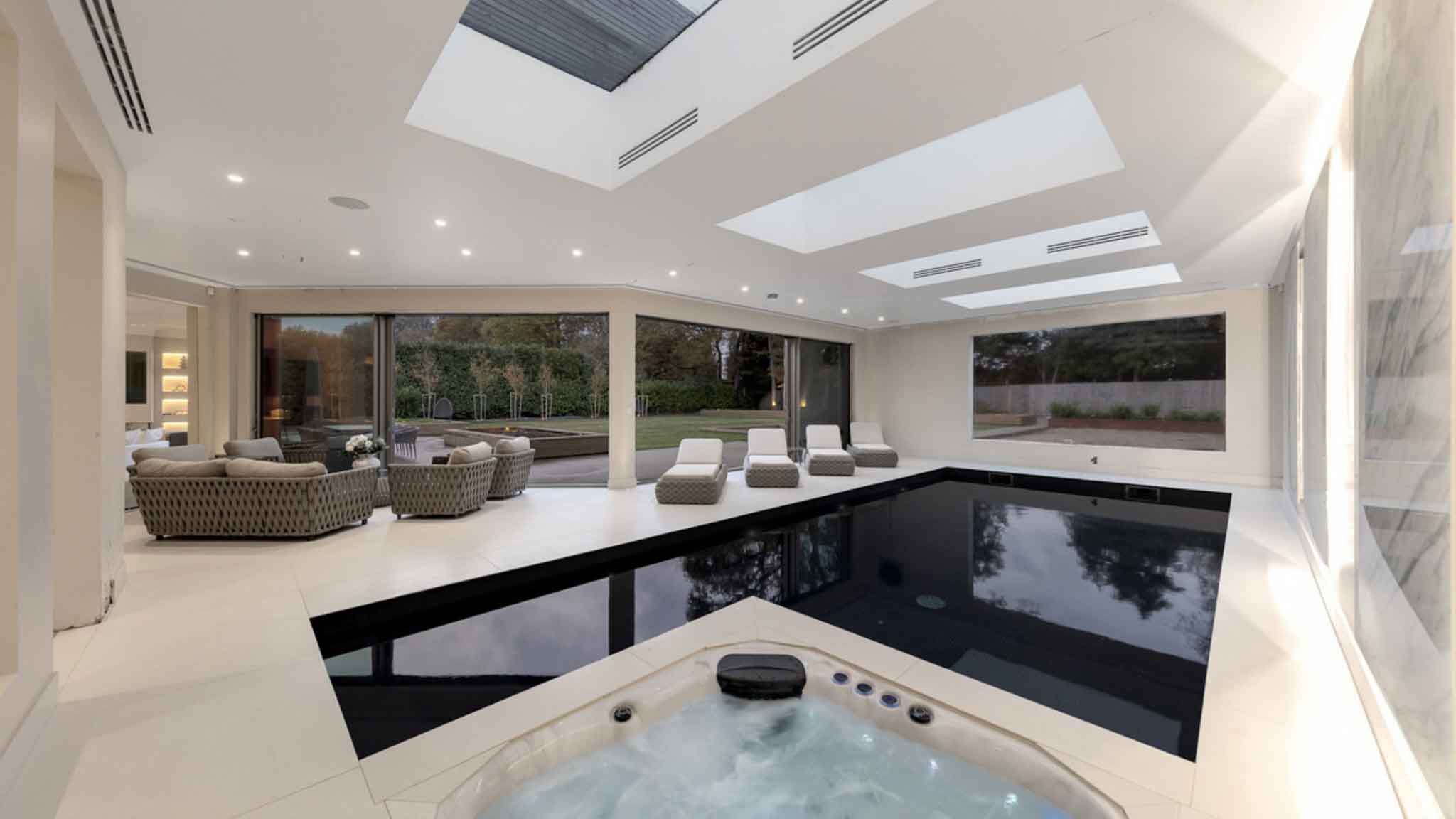Luxury Indoor Pool and Spa Design with Skylights – Surrey Residence