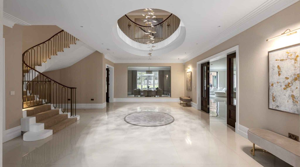 Grand Entrance Hall Interior with Curved Staircase – Surrey Home