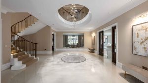 Grand Entrance Hall Interior with Curved Staircase – Surrey Home