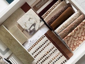 High end interior material samples marble wood textiles moodboard