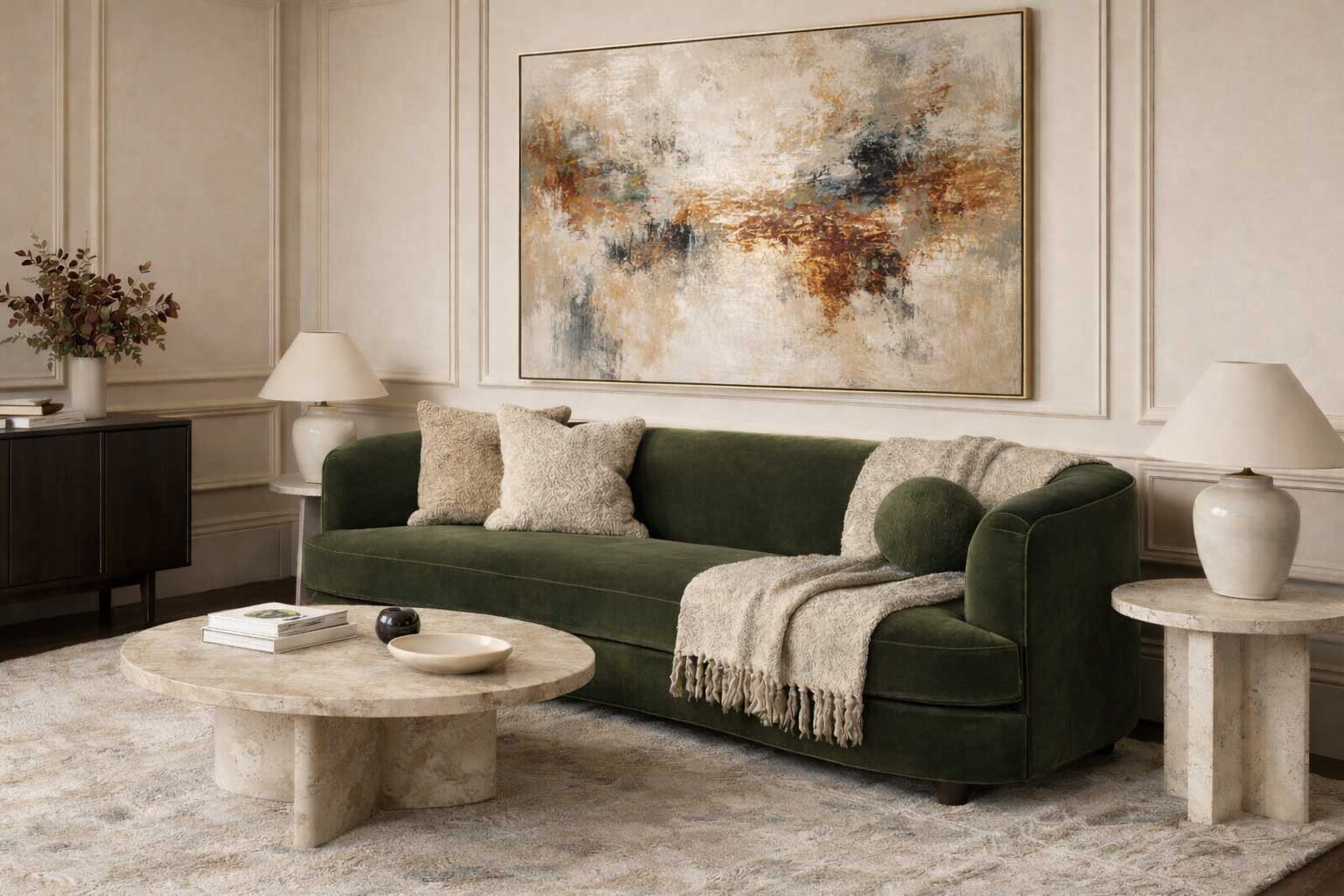 High-end living room featuring a dark moss green velvet curved sofa, round marble coffee table, and large abstract artwork in a refined neutral interior.