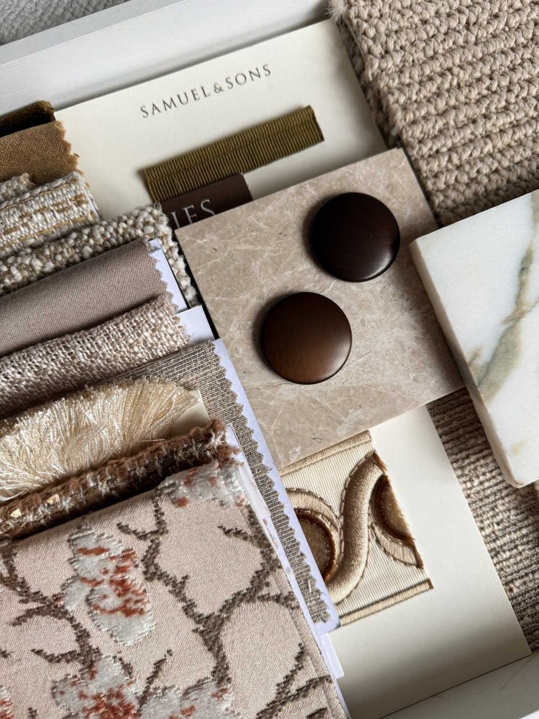 Luxury neutral material palette bronze hardware marble fabric